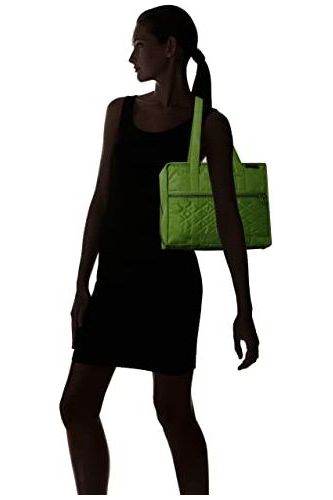 a man standing on a bench with a backpack